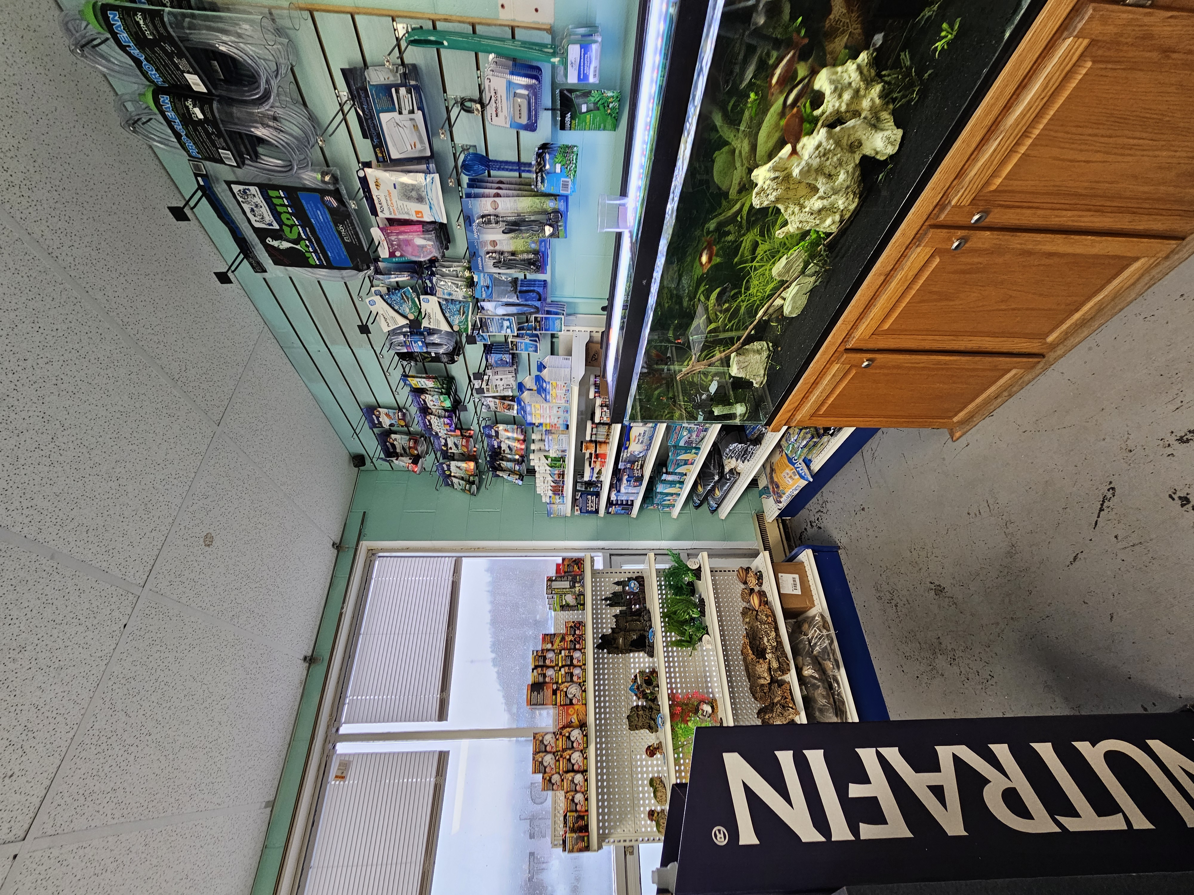 Additional aquarium accessories and fish supplies on display